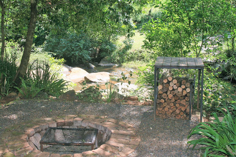 The chalets, their gardens and firepits at Sabie Star Chalets in Sabie, Mpumalanga, South Africa.